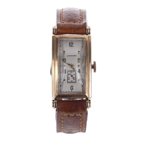 87 - Longines 14ct curved rectangular gentleman's wristwatch, rectangular silvered dial with applied gilt... 