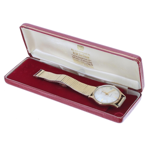 125 - Garrard 9ct automatic gentleman's wristwatch, London 1975, silvered dial with applied gilt twelve an... 