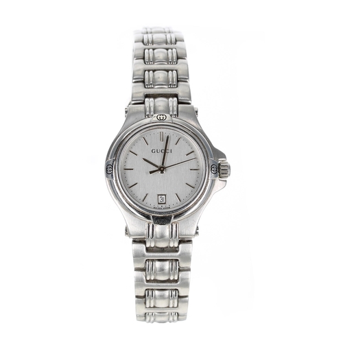 129 - Gucci stainless steel lady's wristwatch, reference no. 9040L, silvered dial, stainless steel bracele... 