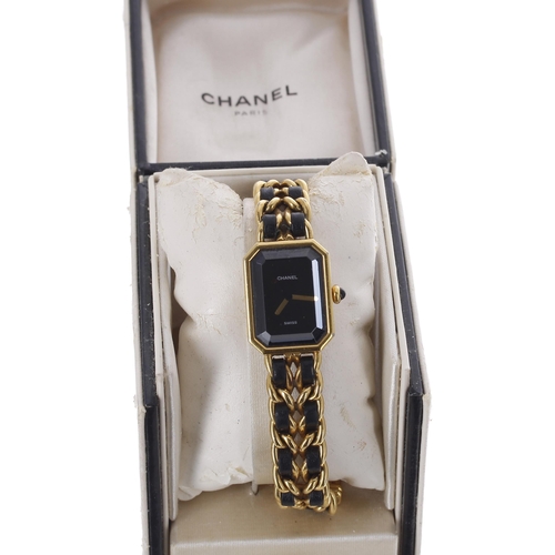 152 - Chanel, Paris rectangular gold plated lady's wristwatch, reference no. R.K. 20508, rectangular black... 