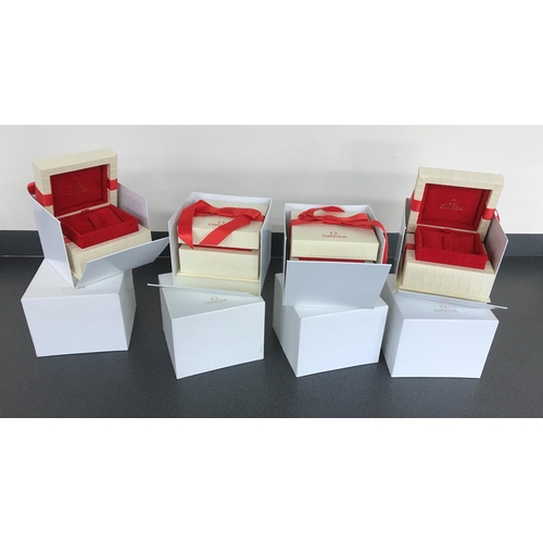 230 - Four Omega jewellery boxes with outer covers