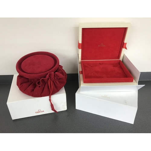 232 - Omega jewellery box with outer cover; together with an Omega jewellery pouch with outer cover (2)... 