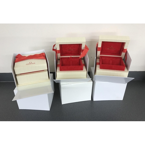 234 - Three Omega jewellery boxes with outer covers