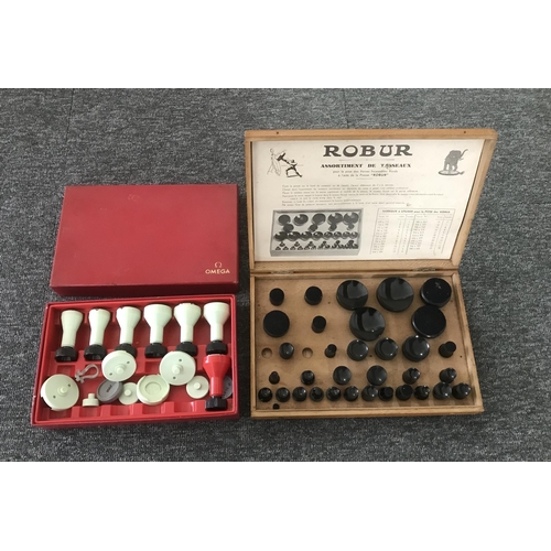 257 - Omega - Incomplete cased set of Omega crystal inserting/removal tools; together with a cased set of ... 