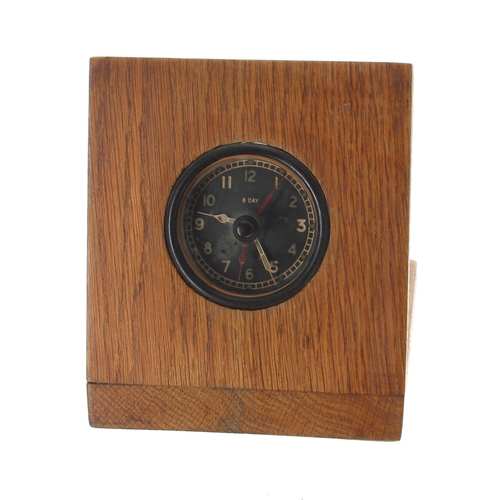 393 - WWII 8-day cockpit clock, mounted in a wooden stand, 2.5'' dial approx; together with a watch displa... 