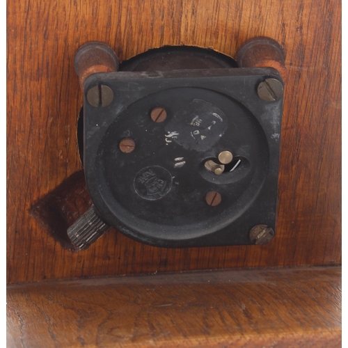 393 - WWII 8-day cockpit clock, mounted in a wooden stand, 2.5'' dial approx; together with a watch displa... 