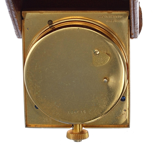 2521 - Jaeger-LeCoultre travel clock, the gilt metal case hinged within a tan leather travel case, case no.... 