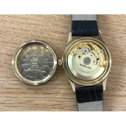 124 - Garrard automatic 9ct gentleman's wristwatch, Birmingham 1988, silvered dial with gilt applied Arabi... 