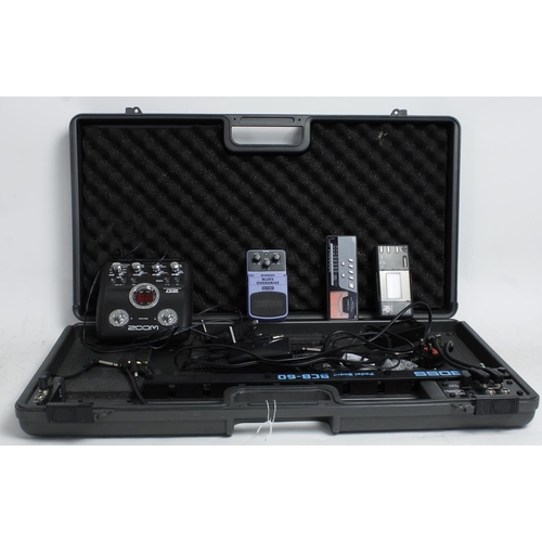 1168 - Boss BCB-60 guitar effects pedal board case; together with a Zoom G2 guitar effects pedal, a Behring... 