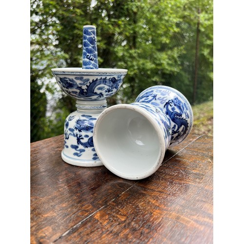 838 - Pair of Chinese export blue and white porcelain candlesticks, of double bowl form decorated with dra... 