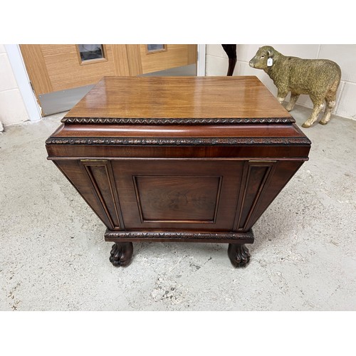 1018 - Fine Regency mahogany cellarette, of sarcophagus form with a hinged cover enclosing a metal lined in... 