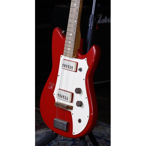 731 - 1960s Futurama II electric guitar; Body: red finish, lacquer checking and finish loss, large finish ... 