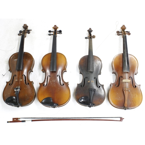 2028 - Early 20th century German three-quarter size violin; also three other full size violins, bow (4)... 