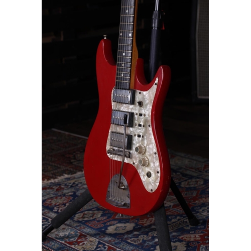 747 - 1960s Rosetti Airstream 3 electric guitar, made in Holland; Body: red finish, lacquer checking, mild... 