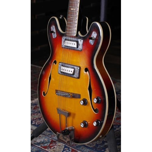 748 - 1970s Encore semi-hollow body electric guitar, made in Japan; Body: three-tone sunburst finish, inse... 