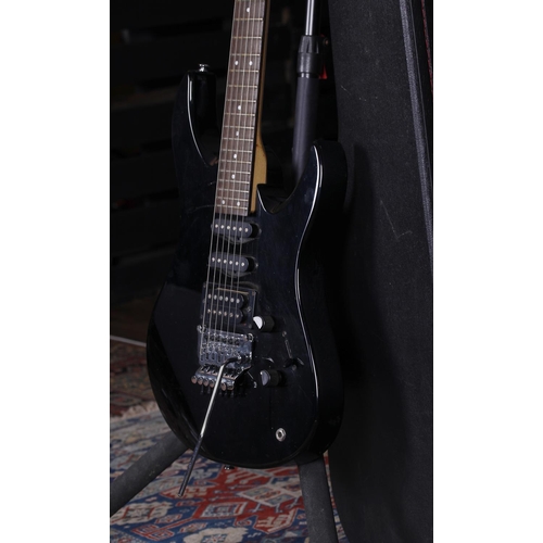 765 - Yamaha RGX312 electric guitar, made in Taiwan; Body: black finish, scuffs, dings and scratches throu... 