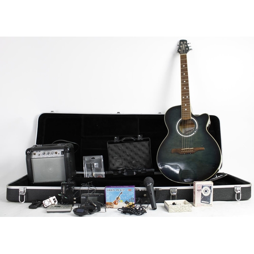 1459 - Mixed guitar lot to include a Guvnor GA555CE electro-acoustic guitar, a bass guitar hard case, an Ea... 