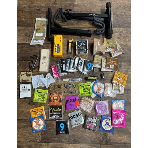 1453 - Selection of guitar spares, tools and accessories to include tuners, guitar strings, a Harley Benton... 