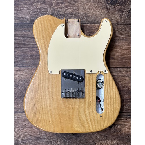 1469 - 1980s one piece ash Telecaster guitar body, natural finish, fitted with a vintage Alnico pickup, thr... 