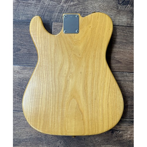 1469 - 1980s one piece ash Telecaster guitar body, natural finish, fitted with a vintage Alnico pickup, thr... 