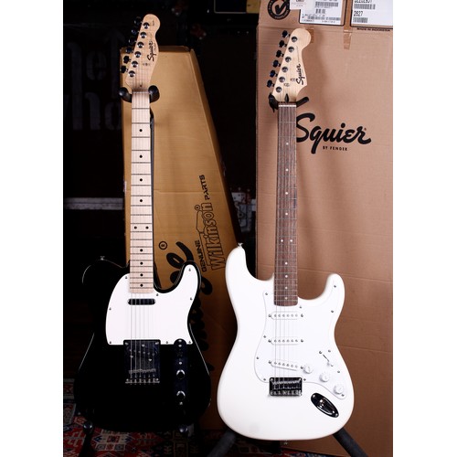 688 - Squier by Fender Affinity Series Tele electric guitar, black finish; together with a Squier by Fende... 