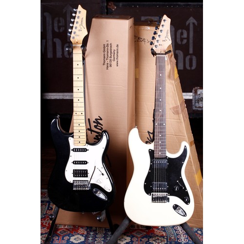 697 - Two Johnson S Type electric guitars, one HSS spec in black finish (missing cavity back plate) and on... 