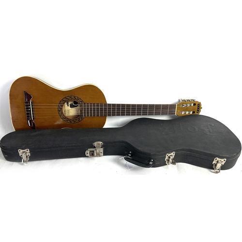 3513 - 1990s Boaz Elykman acoustic nylon string travel guitar; Body: slimline waisted body in natural finis... 