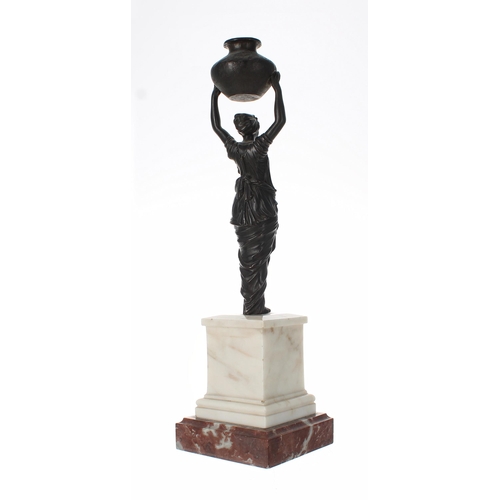 777 - Decorative bronze figure after the antique, modelled as a Grecian maiden holding aloft an urn, mount... 