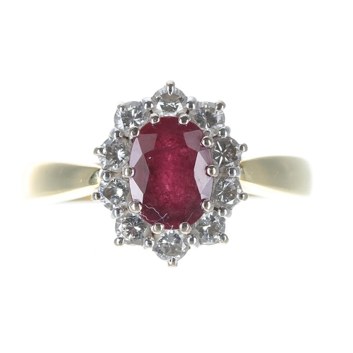 139 - Good modern 18ct yellow gold ruby and diamond oval cluster ring, the oval ruby 1.00ct approx, set in... 