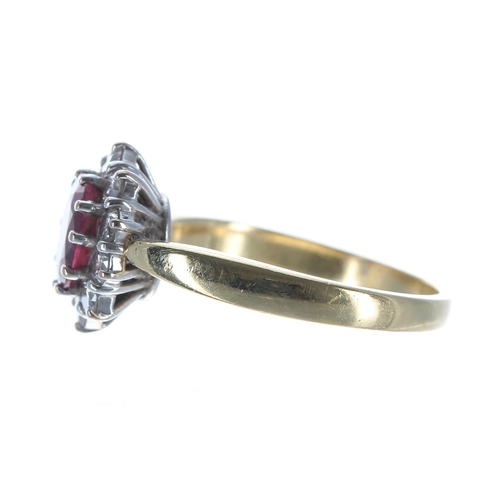 139 - Good modern 18ct yellow gold ruby and diamond oval cluster ring, the oval ruby 1.00ct approx, set in... 