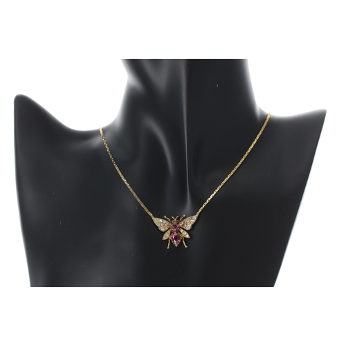 144 - Attractive 18ct yellow gold ruby and diamond fly design necklace, the pendant with two rubies 1.00ct... 