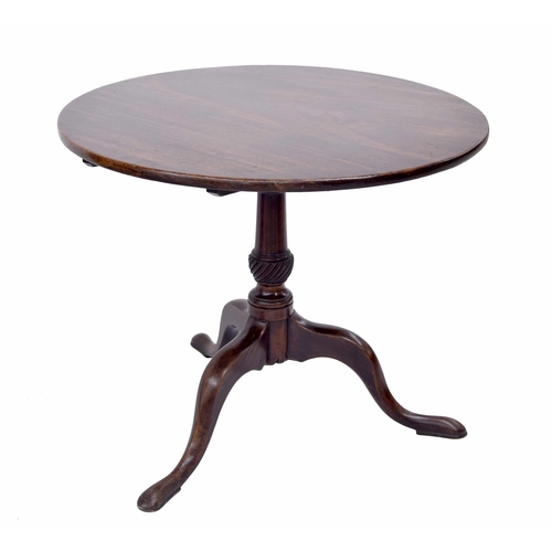 1032 - Georgian mahogany circular occasional table, the plain tilt top raised on a central carved pillar su... 