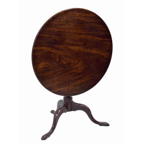 1032 - Georgian mahogany circular occasional table, the plain tilt top raised on a central carved pillar su... 