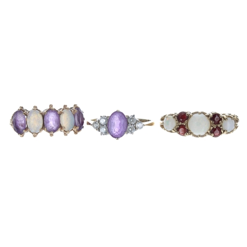 171 - Three 9ct gem set dress rings, to include opals, amethysts and garnets, 7.3gm (3)