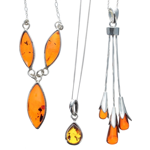 199 - Modern silver cabouchon pear shaped amber pendant upon a slender silver chain; together with a silve... 