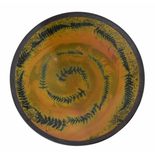 561 - Andrew Hill (b.1964) studio pottery circular charger with spiral fern leaf decoration, with the arti... 