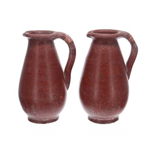 807 - Pair of terracotta pottery jugs, with an artists monogram AT to the undersides, 8.5