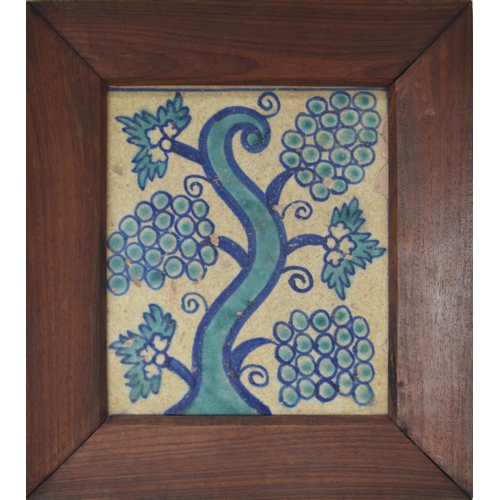 808 - Decorative framed Portuguese tile, portraying a primitive fruiting branch with foliage, 7