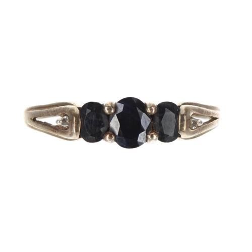 291 - 9ct sapphire three stone ring, 1.7gm, ring size P