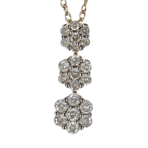 360 - Modern TJC 9ct diamond pendant upon a slender 9ct chain, twenty-one round brilliant-cut diamonds, 0.... 