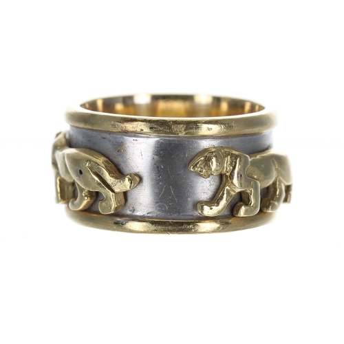 388 - Designer 18ct bicolour band ring, set with three panthers on a white ground, stamped 'AYKA 18', widt... 