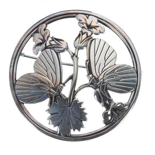 577A - Georg Jensen silver circular brooch designed by Arno Malinowski, no.283, cast and pierced with butte... 