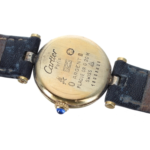 42 - Must de Cartier silver-gilt lady's wristwatch, serial no. 18008xxx, black dial, cabouchon crown, mod... 
