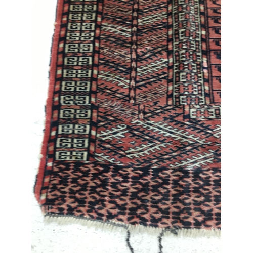 1002 - Antique hand-made Hatchli rug, 52