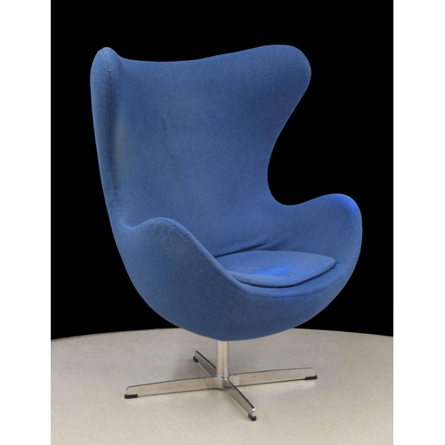 682 - After Arne Jacobson - upholstered egg chair, pale blue, on a chrome support, 34