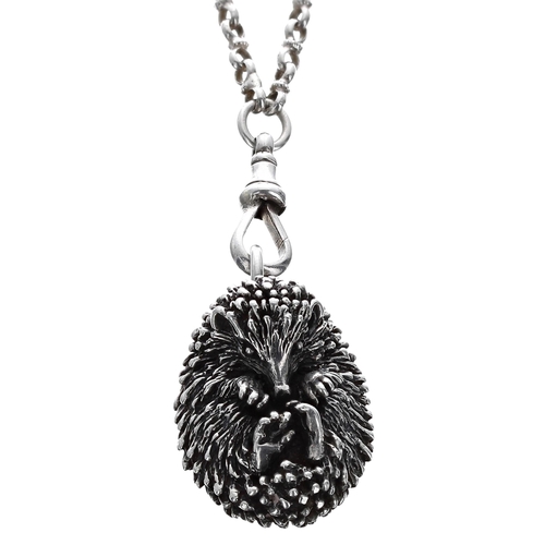 304 - Cast silver hedgehog pendant on chain, London 1992, maker 'LO' (possibly Louis Osman), the pendant 2... 