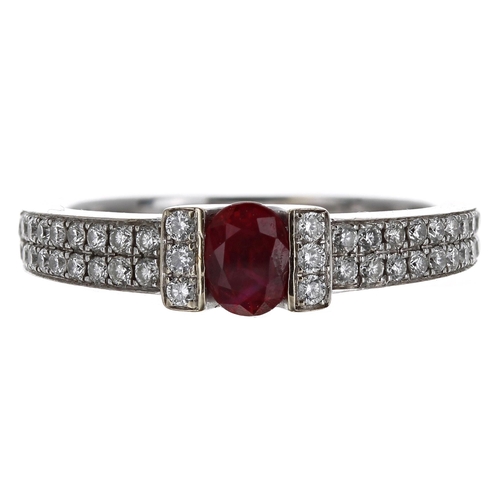 125 - Pretty modern 18ct white gold ruby and diamond ring, the oval ruby 0.30ct approx within pavé diamond... 