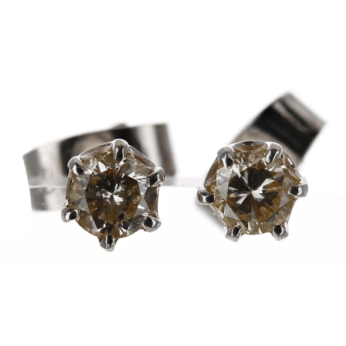 408 - Pair of 18ct white gold diamond stud earrings, 0.34ct approx in total, 1.1gm, 4mm