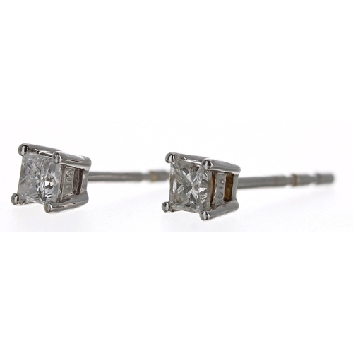 412 - Pair of white gold solitaire princess-cut diamond stud earrings, approx 0.20ct, 2.5mm (no backs) ... 