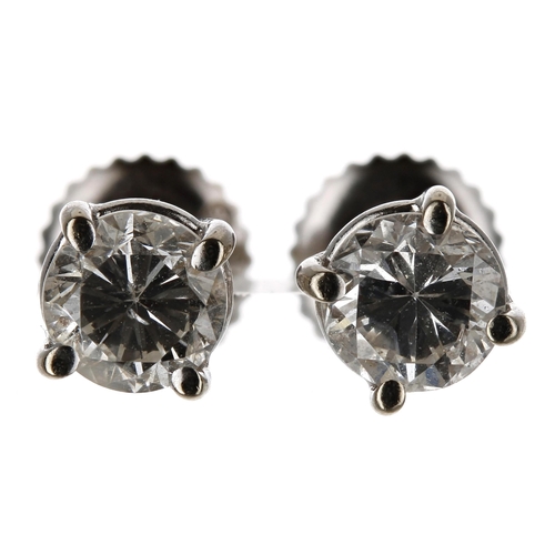 421 - Pair of 14ct white gold brilliant-cut diamond stud earrings, screw fittings approx 0.80ct in total, ... 